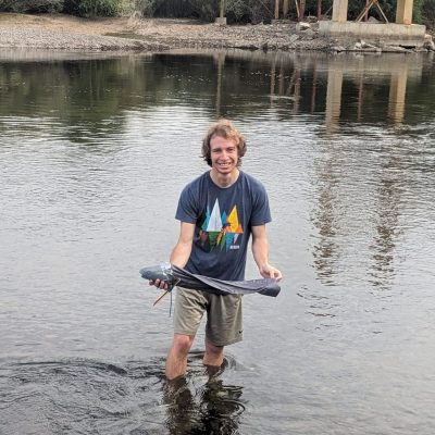 TJ in Mongolia this past summer, testing out research methodologies for a study on taimen (Hucho taimen) as part of his role as an Assistant Instructor. Photo: C. Smith